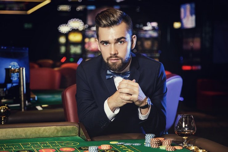 Antarmuka aplikasi ou4d menampilkan meja live dealer blackjack dengan dealer langsung dan pemain yang terhubung.